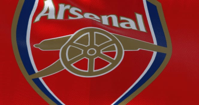London, UK, May 2022: The flag of Arsenal Football Club waving. Arsenal is a professional football club based in Islington, London, England.