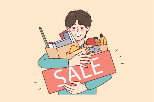 Happy man holding bags with products bought on sale or promotion. Smiling male shopaholic excited with discount offers on black Friday. Shopping concept. Vector illustration.