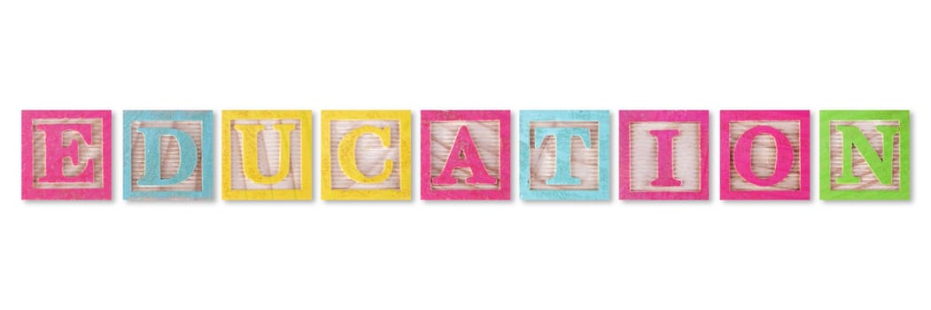 An education concept with childs wood blocks on white with clipping path to remove shadow