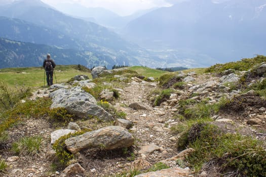 Landscape of Lienz Dolomites in Austria. Road and panorama of massive Alpine mountains. East Tyrol