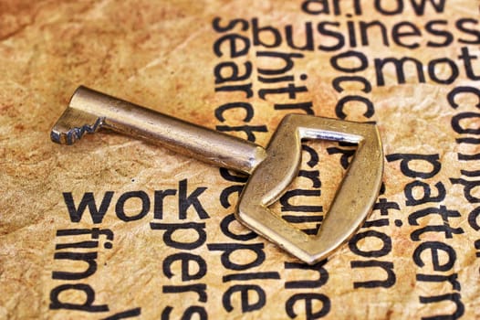 Golden key on work text