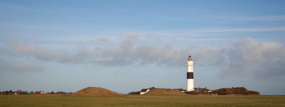Panoramic image of Kampen lighthouse against sky, Sylt, North Frisia, Germany