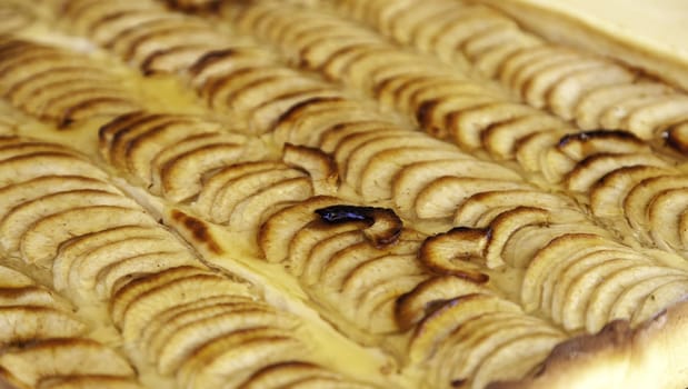Detail of handmade apple pie in a market, sweet dessert