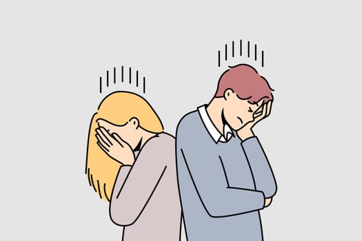 Unhappy couple ignore talking after fight or misunderstanding. Stubborn man and woman avoid communication after quarrel. Breakup and relationship problems.