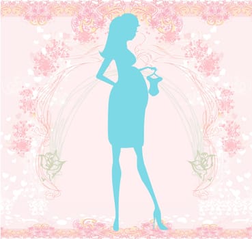 Beautiful pregnant woman on shopping for her new baby- abstract background