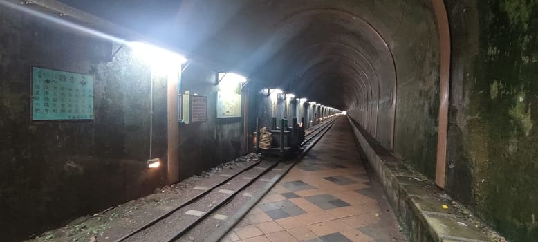 Baiji Tunnel, Taoyuan City - Jul 27, 2022 : Originally part of the north section of the cross-Taiwan No. 7 highway, the Japanese opened a special tunnel for pedestrians, air defense and evacuation in 1944, Taoyuan City, Taiwan