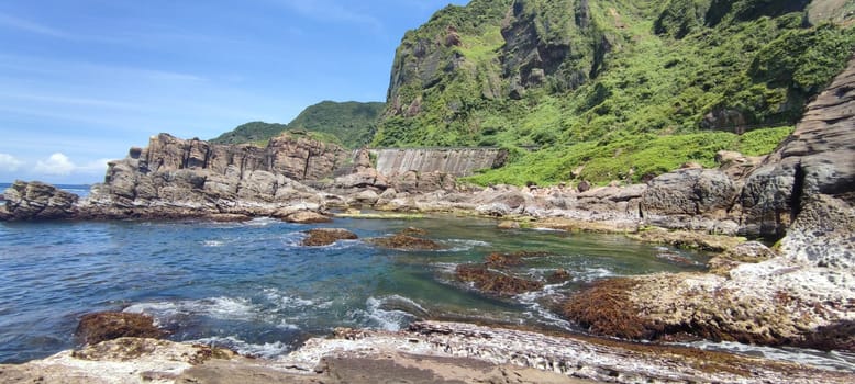 Nanya Strange Rocks, New Taipei City - Jul 27, 2022 : Strange rocks and rocks stretching hundreds of meters, can be said to be Bamboo Shoot Rock, Ice Cream Rock, Sea Dog Rock, etc. in the Natural Geology Classroom, Xinshi, Taiwan