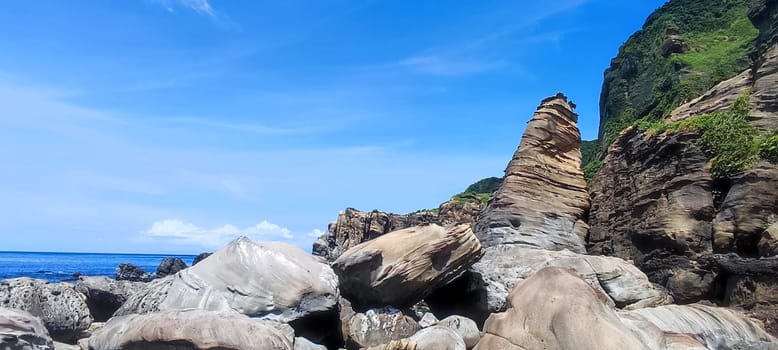 Nanya Strange Rocks, New Taipei City - Jul 27, 2022 : Strange rocks and rocks stretching hundreds of meters, can be said to be Bamboo Shoot Rock, Ice Cream Rock, Sea Dog Rock, etc. in the Natural Geology Classroom, Xinshi, Taiwan