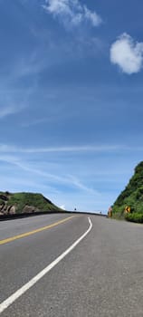 Northern Coastal Highway, New Taipei City - Jul 27, 2022 : Because the north coast is located at the cut-in surface of the northeast monsoon, it has been subjected to wind and sea erosion over the years, forming a variety of special landforms such as sea erosion topography and strange rocks and rocks