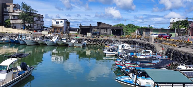 Gongliao Fishing Port, New Taipei City - Jul 27, 2022 : Located in Gongliao District and Miri Longdong Bay, surrounded by mountains on three sides and only facing the sea in the northeast to form a natural small bay, New Taipei City, Taiwan