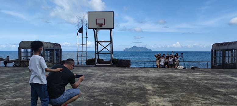 Daxi Daan Temple front basketball court, Yilan County - Jul 27, 2022 : Daxi Daan Temple front basketball court! Sitting on the dreamy sea view of Guishan Island, Yilan County, Taiwan