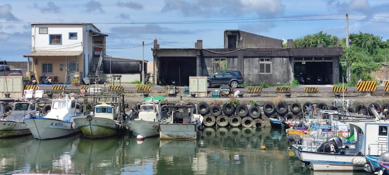 Gongliao Fishing Port, New Taipei City - Jul 27, 2022 : Located in Gongliao District and Miri Longdong Bay, surrounded by mountains on three sides and only facing the sea in the northeast to form a natural small bay, New Taipei City, Taiwan