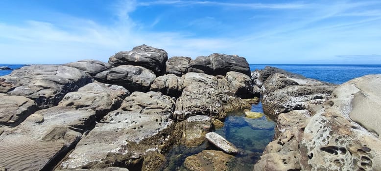 Nanya Strange Rocks, New Taipei City - Jul 27, 2022 : Strange rocks and rocks stretching hundreds of meters, can be said to be Bamboo Shoot Rock, Ice Cream Rock, Sea Dog Rock, etc. in the Natural Geology Classroom, Xinshi, Taiwan