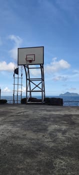 Daxi Daan Temple front basketball court, Yilan County - Jul 27, 2022 : Daxi Daan Temple front basketball court! Sitting on the dreamy sea view of Guishan Island, Yilan County, Taiwan