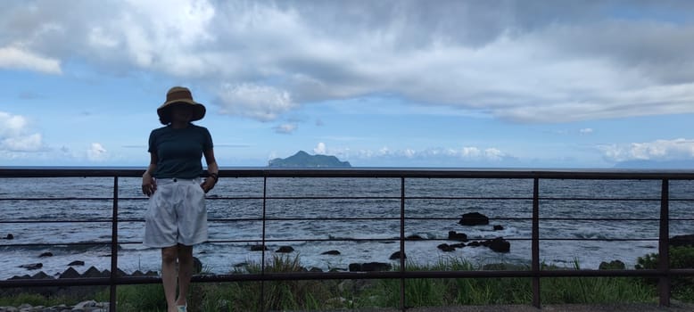 Daxi Daan Temple front basketball court, Yilan County - Jul 27, 2022 : Daxi Daan Temple front basketball court! Sitting on the dreamy sea view of Guishan Island, Yilan County, Taiwan