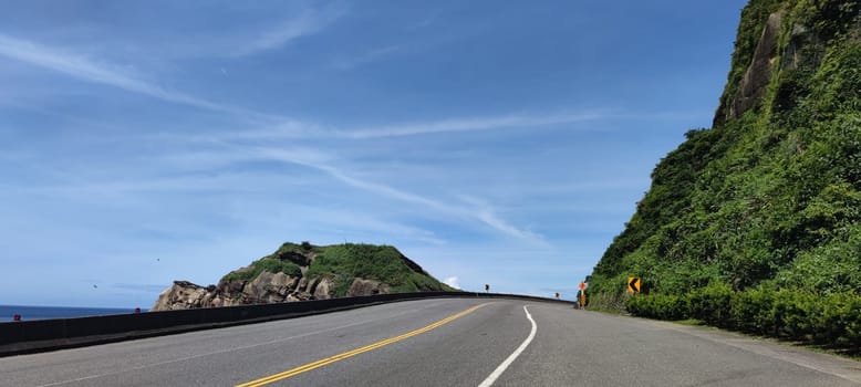 Northern Coastal Highway, New Taipei City - Jul 27, 2022 : Because the north coast is located at the cut-in surface of the northeast monsoon, it has been subjected to wind and sea erosion over the years, forming a variety of special landforms such as sea erosion topography and strange rocks and rocks