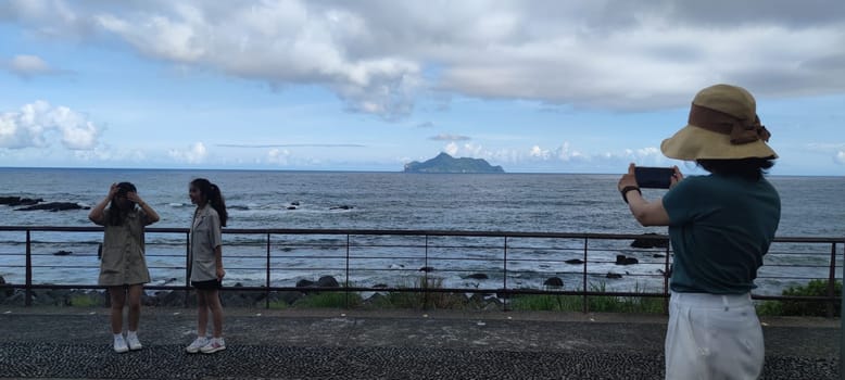 Daxi Daan Temple front basketball court, Yilan County - Jul 27, 2022 : Daxi Daan Temple front basketball court! Sitting on the dreamy sea view of Guishan Island, Yilan County, Taiwan