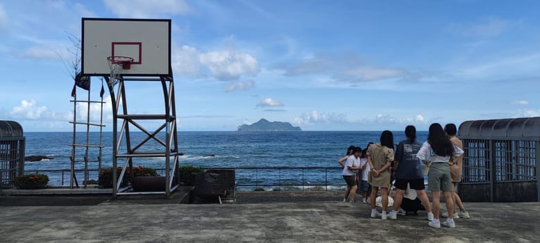 Daxi Daan Temple front basketball court, Yilan County - Jul 27, 2022 : Daxi Daan Temple front basketball court! Sitting on the dreamy sea view of Guishan Island, Yilan County, Taiwan