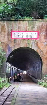 Baiji Tunnel, Taoyuan City - Jul 27, 2022 : Originally part of the north section of the cross-Taiwan No. 7 highway, the Japanese opened a special tunnel for pedestrians, air defense and evacuation in 1944, Taoyuan City, Taiwan