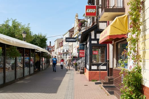 Shopping street in the old town of Kolobrzeg on the coast of the Baltic Sea in Poland