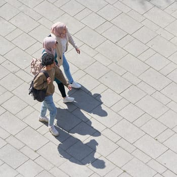 three young Muslims walking in the city center of Magdeburg in Germany