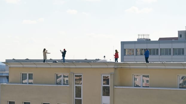 Production of a music video on the roof of a house in the city center of Magdeburg in Germany