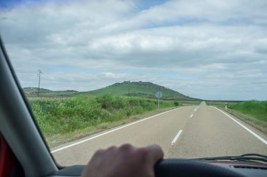 Approaching to Magacela town from EX-348 road. View from the inside of the car