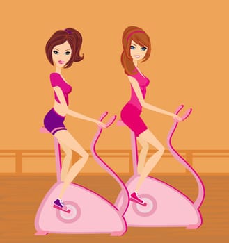 Girls on the exercise bikes