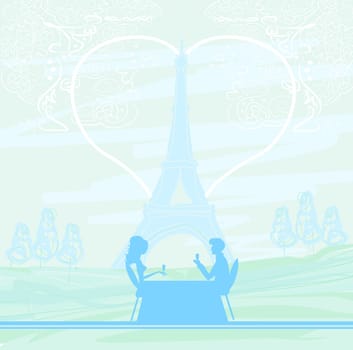 Young couple flirt and drink champagne in Paris