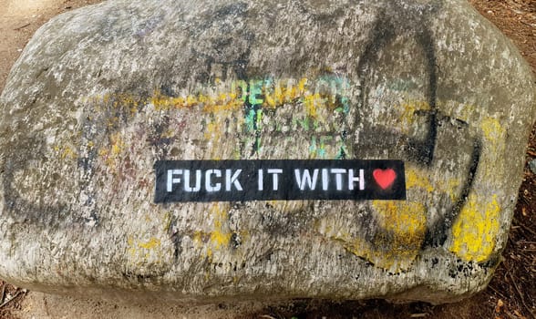 Fuck it with heart,written on stone