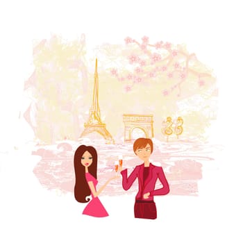 Young couple flirt and drink champagne in Paris