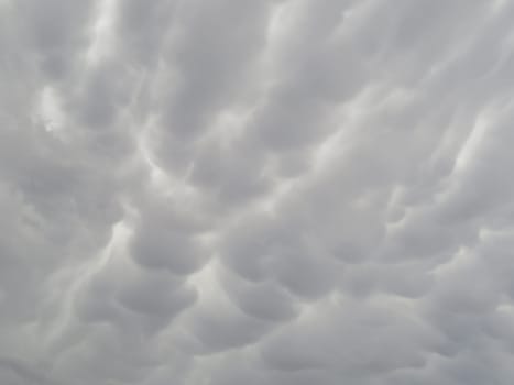 beautiful gray storm clouds arranged to rain water with wavy shapes