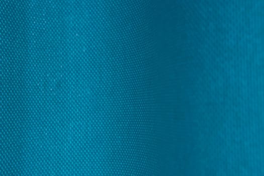 blue fabric cloth background texture with selectiv focus.