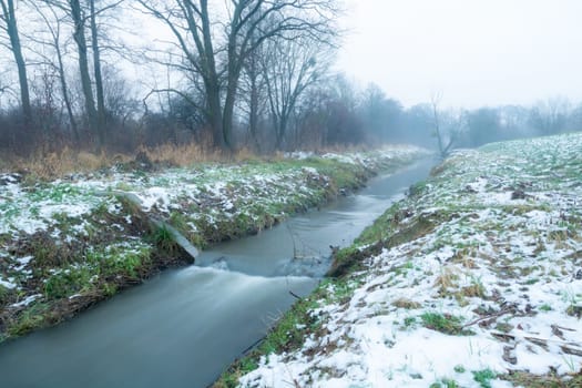 The little river Uherka in eastern Poland, winter view