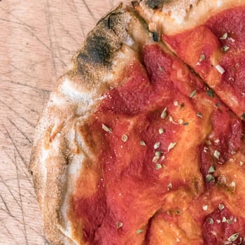 Pizza without mozzarella. Close-up. Top view.