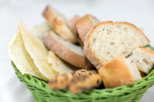 Wicker basket with assorted baking products. Shallow DOF.