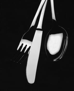 photo of black and white kitchen cutlery
