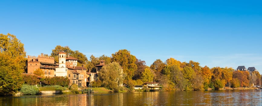 Turin, Italy - Circa November 2021: outdoors panorama with scenic Turin Valentino castle at sunrise in autumn