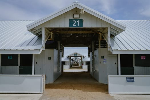 April 17, 2022, Lexington, Kentucky: Row of horse stables at Keeneland Race Track in Lexington, Kentucky