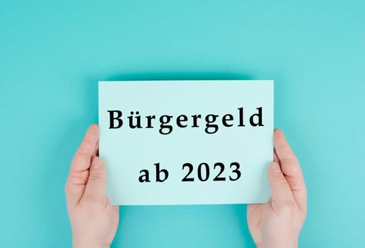 The german word for citizen money is standing on a paper, new financial help system for unemployment in Germany, social issue