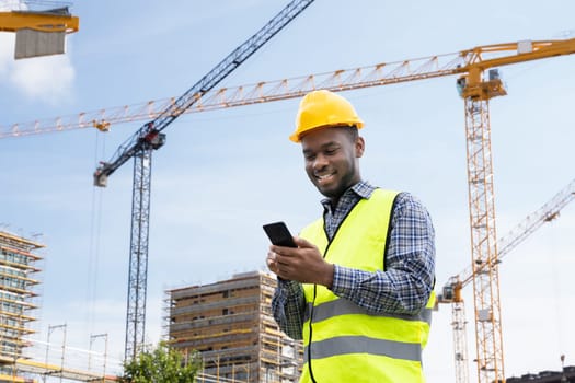 Builder Worker Using Phone. Construction Employee Communication