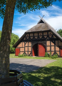 Beautiful house with a thatched roof on the Baltic Sea.