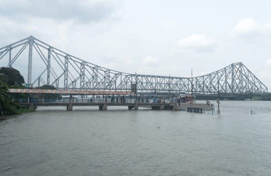 The Howrah Bridge, a balanced attached cantilever bridge covering over the Hooghly River in West Bengal, India, South Asia Pacific June 28, 2022