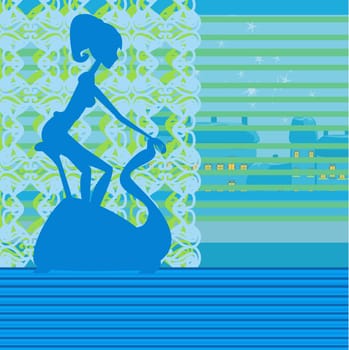 Girl on the exercise bike