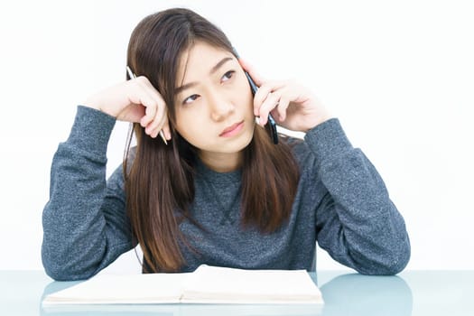 Woman long hair Woman using mobile phone and  writing notebook on white background