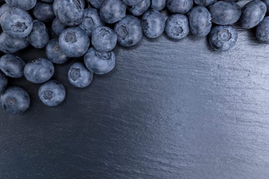 Fresh blueberry summer juicy fruits for a healthy diet. Organic blueberries for a healthy food and life concept.