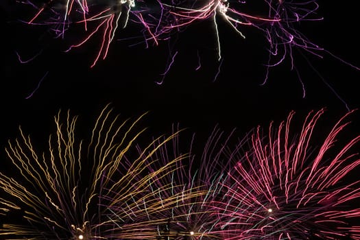 firework celebrate event festive colors explosion bright festive pyrotechnics glowing light background
