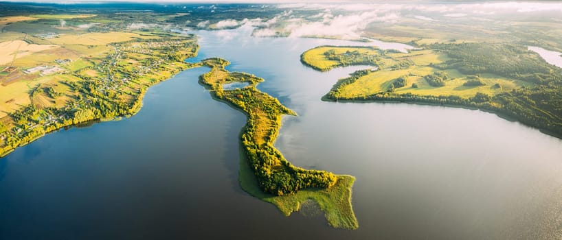 Lyepyel District, Lepel Lake, Beloozerny District, Vitebsk Region. Aerial View Of Residential Area With Houses In Countryside. Top View Of Island From High Attitude In Autumn Morning. Bird's Eye View Of Old Lyepyel Cityscape Skyline. Panoramic View
