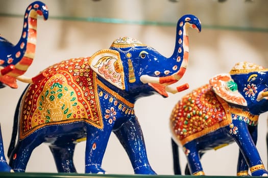 Goa, India.  Painted Elephant Souvenir Of Porcelain On Shelf In Store. Goods For Tourists.