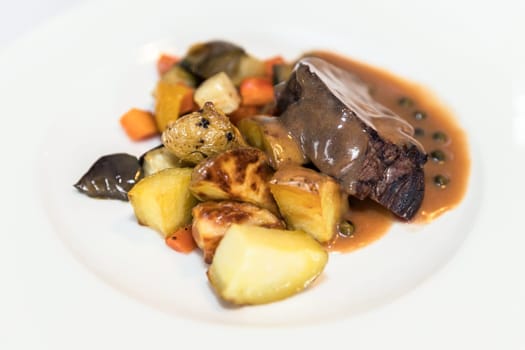 Italian beef and potato stew. Second dish. Prepared by a chef.